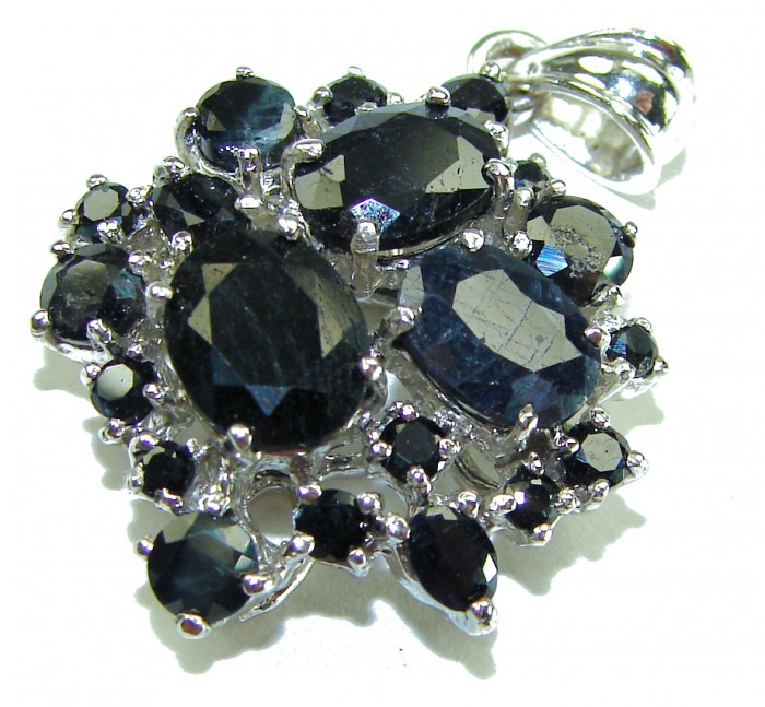 Incredible pear cut 22.4 carat Sapphire .925 Sterling Silver handcrafted pendant - Close-up of sapphire pendant with Sterling silver setting.