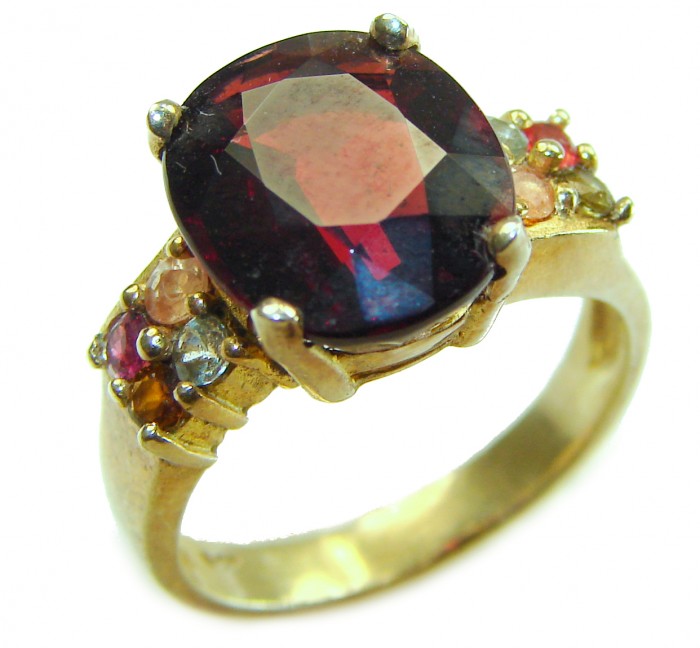 Passion 10.5 carat round cut Red Garnet .925 Sterling Silver handcrafted ring; s. 6 1/2 - Side view of a red garnet ring with multicolor accent stones.