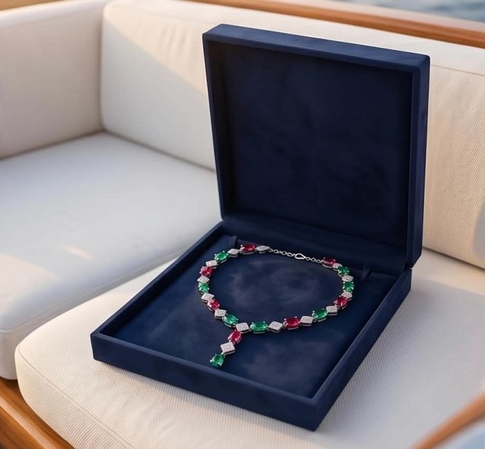 Ginevra - Luxurious natural 18.4 carat Ruby Emerald .925 Sterling Silver handmade Statement necklace - Luxurious Ginevra necklace in box, side view showing Ruby and Emerald stones.