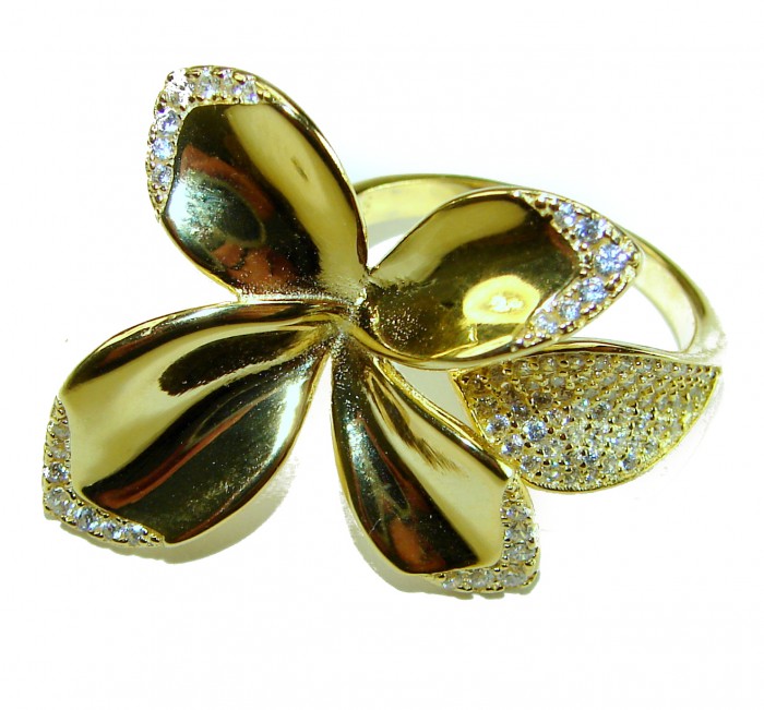 Lotus flower White Topaz highly polished 18K Gold over .925 Sterling Silver Italy made ring s. 7 adjustable - Gold lotus flower ring, top view, with white topaz accents.