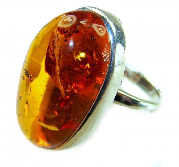 Beauty of the Nature Baltic Amber .925 Sterling Silver handcrafted ring; s. 7 adjustable - Close-up of Baltic amber ring with .925 sterling silver band.