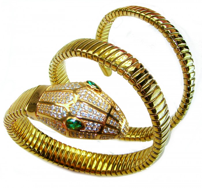 SERPENTINE Precious Snake Genuine 4.2 carat Emerald 925 Sterling Silver dipped in 18K Gold handcrafted Bracelet - Gold snake bracelet with emerald eyes, top view close-up.