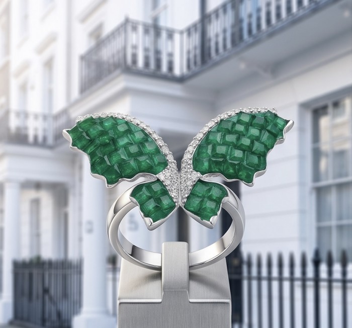 10.2 carat authentic mystery setting Emerald .925 Sterling Silver handcrafted Statement Ring size 7 - Close-up of emerald butterfly ring in sterling silver setting.