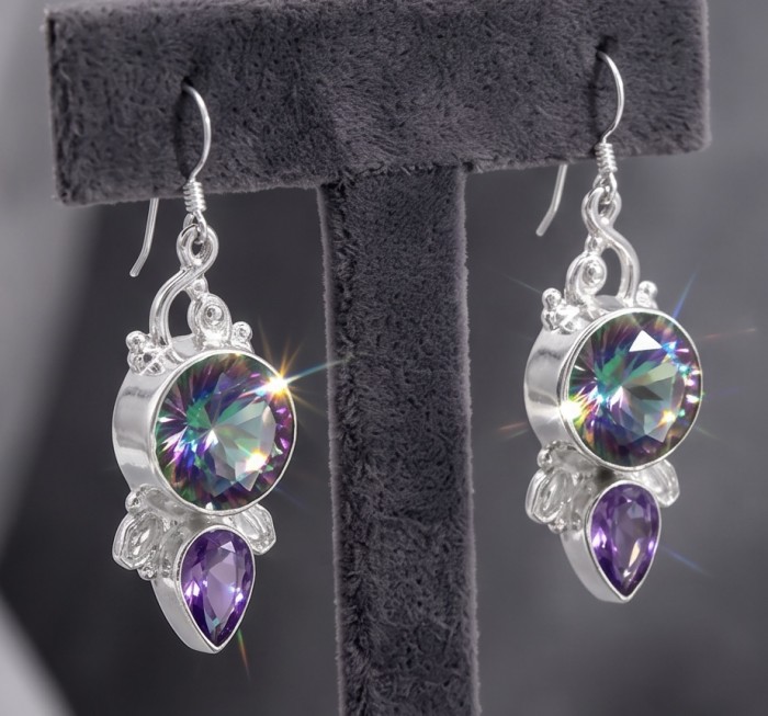 14.2 carat Mystic Topaz Silver earrings - Mystic Topaz Silver earrings, front view close-up on black stand.