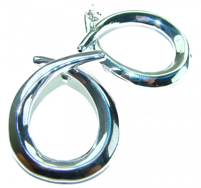 Large 1 5/8 inches long highly polished .925 Sterling Silver Italy made Earrings - Sterling silver earrings, top view, showcasing polished finish.