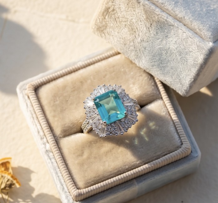 Wonderland 9.5 carat Brazilian Paraiba Tourmaline .925 Sterling Silver Handcrafted Ring size 7 - Paraiba tourmaline ring in box, top view, showcasing stone and setting.