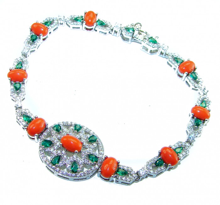 Serenity 42.5 carat genuine Coral Emerald .925 Sterling Silver handmade Statement Bracelet - Coral and emerald necklace, top view, on white background.