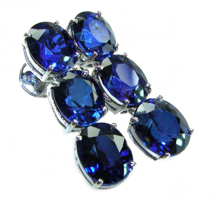 Oceania - Deep Ocean 22.5 carat London Blue Topaz .925 Sterling Silver handmade Statement earrings - Close-up of Oceania deep ocean blue topaz stones in sterling silver setting