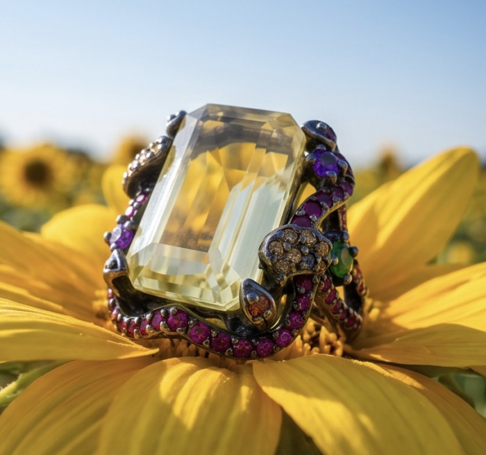 Costa del Sol 29.4 carat Lemon Quartz black rhodium over .925 Sterling Silver handcrafted ring size 8 - Close-up of Costa del Sol ring with Lemon Quartz on a sunflower.