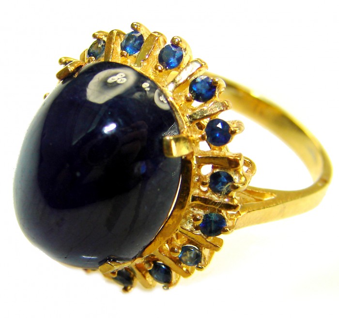 Authentic 14.5 carat Brazilain Kyanite 2.1 carat rare Grandidierite .925 Sterling Silver dipped in 22K Gold handcrafted Ring size 7 1/4 - Side view of gold ring with blue stones and large centerpiece.