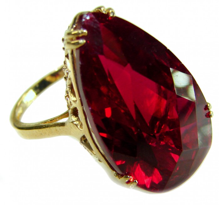 Carmen Natural 28.4 carat Ruby .925 Sterling Silver dipped in 22K Gold handmade Large Statement Ring size 7 - Close-up of Carmen 28.4 carat ruby in gold setting, side view