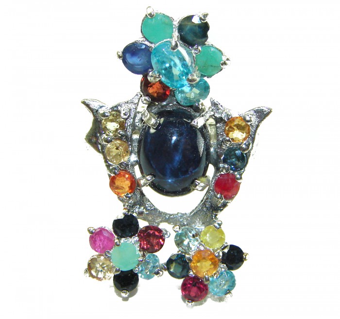 Classic design Genuine 16.5 carat Star Sapphire .925 Sterling Silver handcrafted Ring size 7 - Colorful gemstone and star sapphire pendant, front view.