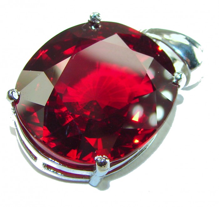 Bella Rosa oval cut 32.5 carat Red Topaz .925 Sterling Silver handmade Pendant - Close-up of Bella Rosa oval cut 32.5 carat red topaz in sterling silver.