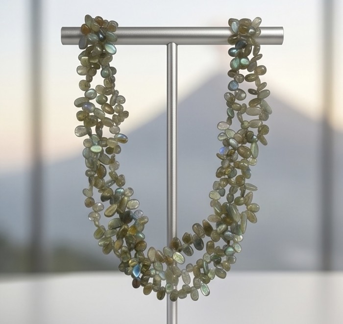 Blue Cascade Genuine Labradorite .925 Sterling Silver handcrafted Necklace - Necklace display of Blue Cascade Genuine Labradorite on silver stand