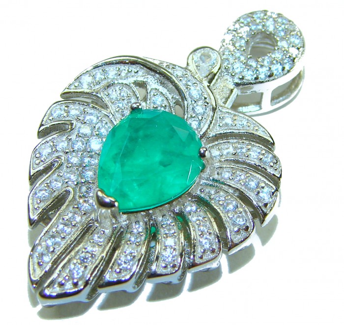 Luxurious Heart Genuine 5.2 carat Colombian Emerald .925 Sterling Silver Statement pendant - Emerald pendant with diamonds, close-up view, showcasing intricate design.