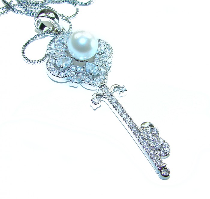 Magic Key- pearl .925 Sterling Silver handcrafted necklace - Sterling silver key necklace with pearl, top view.
