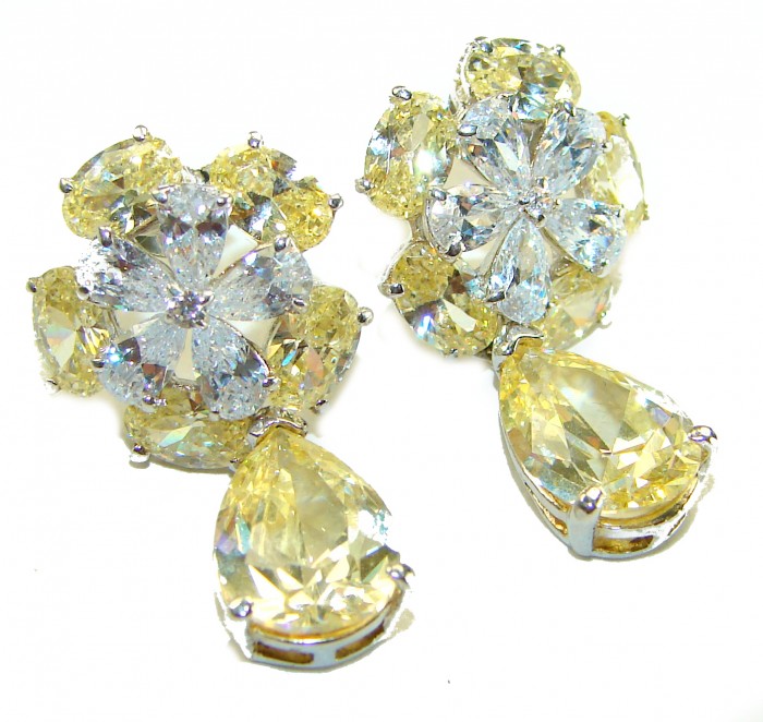 Luxurious 10.5 carat Golden - yellow Montana Sapphire .925 Sterling Silver handcrafted earrings - Front view of luxurious golden-yellow Montana sapphire earrings.
