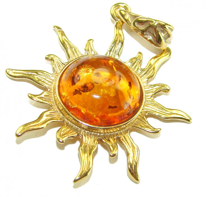 Bright Sun Baltic Polish Amber 22K Gold over .925 Sterling Silver handcrafted Pendant - Sun-shaped amber pendant in gold, top view.