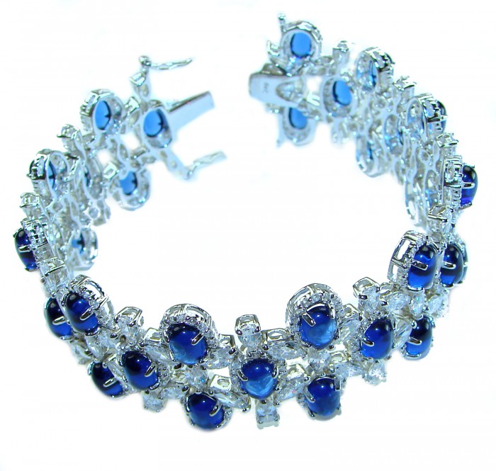 Real Gift of Nature 55.5 carat Authentic African Kyanite .928 Sterling Silver handcrafted Bracelet - Silver bracelet with blue stones, side view detailing clasp and design.