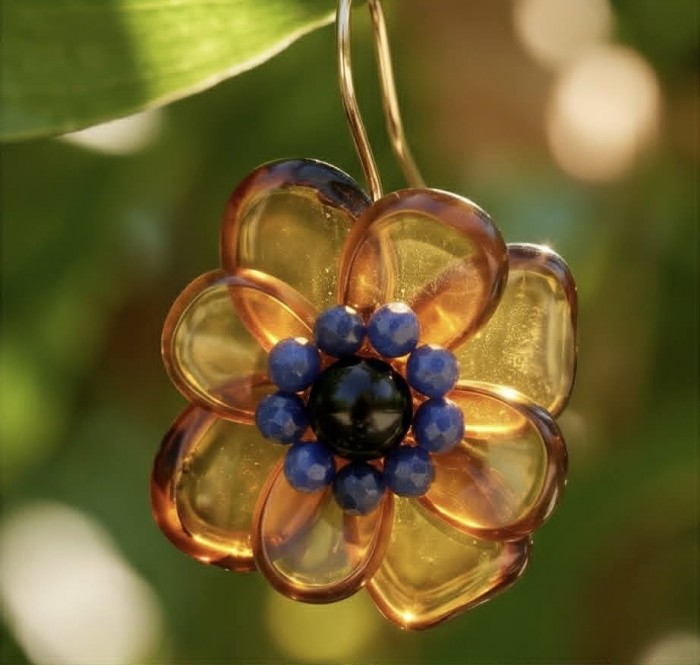 Summer Flowers Wonderful natural Baltic Amber 14K Gold over .925 Sterling Silver entirely handcrafted earrings - Close-up of amber flower earring with blue and black bead details.