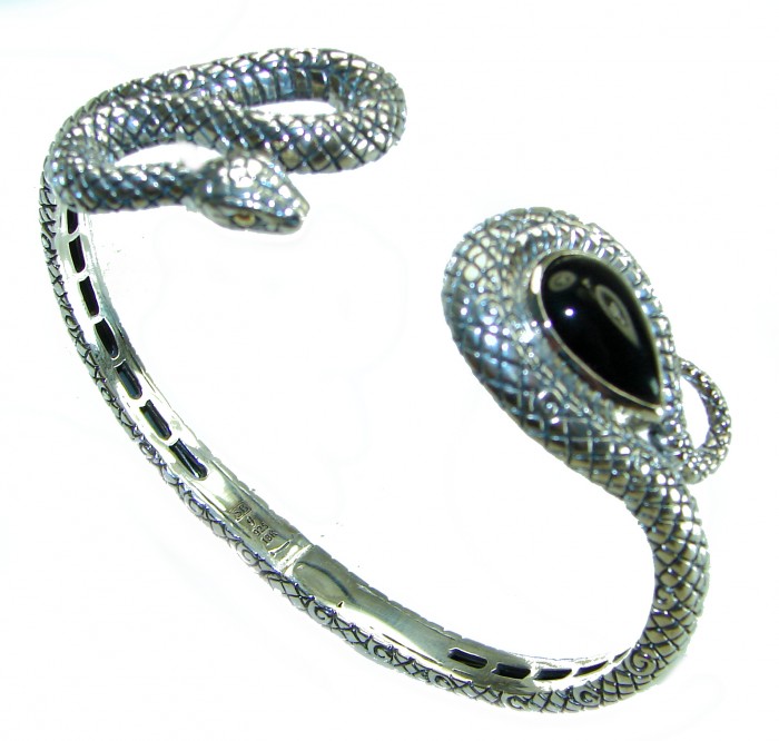 Huge 30.2 carat Precious Snake Genuine Onyx .925 Sterling Silver handcrafted Bracelet - Snake-shaped bracelet with onyx stone, angled top view.