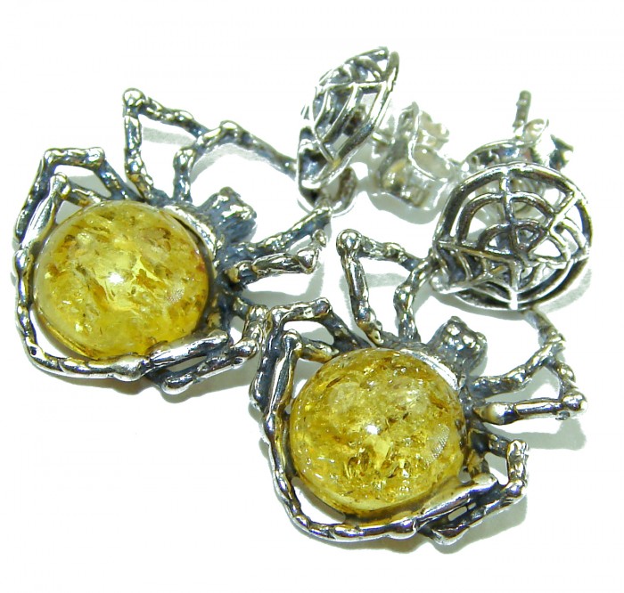 Golden Spiders authentic Baltic Amber .925 Sterling Silver earrings - Close-up of Golden Spiders earrings with Baltic Amber and sterling silver.