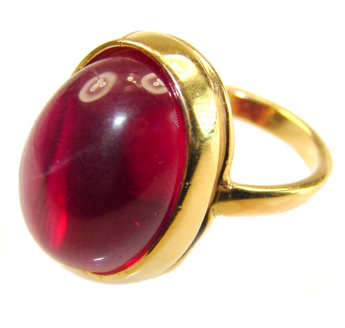 Bella Rosa Genuine 27.8 CARAT Ruby .925 Sterling Silver dipped in 18K Gold Large Statement Ring size 6 1/4 - Close-up of a gold ring with large red ruby stone