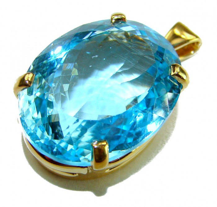 Atlantica oval cut 29.8 carat Swiss Blue Topaz 18K Gold over .925 Sterling Silver Handcrafted Pendant - Close-up of oval cut Swiss Blue Topaz pendant in 18K gold setting.