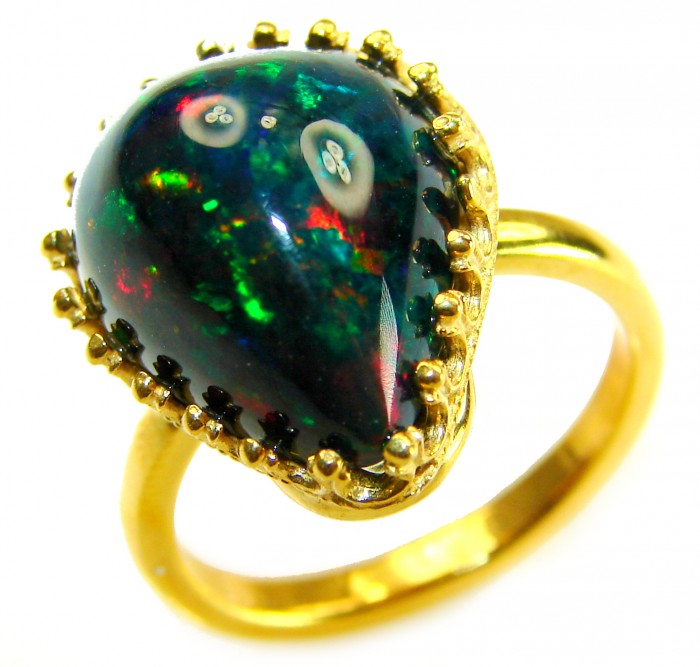 A COSMIC POWER Genuine 30.2 carat Black Opal 18K Gold over .925 Sterling Silver handmade Ring size 8 1/2 - Close-up of a 30.2 carat Black Opal ring with 18K gold setting.