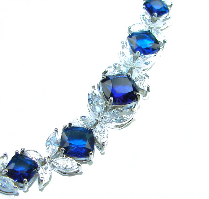 Gabriella 22.2 carat authentic Sapphire rhodium over .925 Sterling Silver handcrafted Statement Bracelet - Close-up of blue sapphire bracelet with diamond accents.