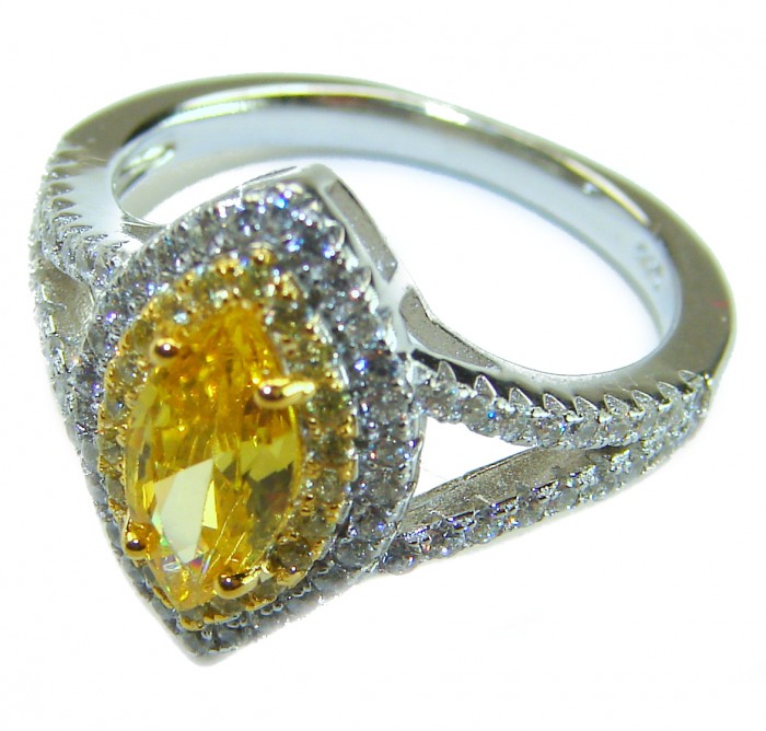 Marquise cut 4.2 carat yellow Sapphire .925 Sterling Silver brilliantly handcrafted ring s. 7 1/4 - Close-up of marquise cut yellow sapphire ring with silver band.