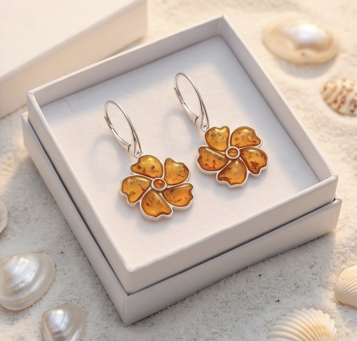 Serenity - Authentic Baltic Amber .925 Sterling Silver handcrafted earrings - Flower-shaped amber earrings in box on soft background with shells