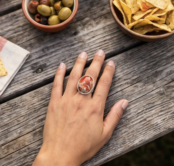 Queen of Fire best quality 22.4 carat Mexican Opal RHODIUM over .925 Sterling Silver handmade ring 5 - Mexican Opal ring worn on hand, with snacks in the background.