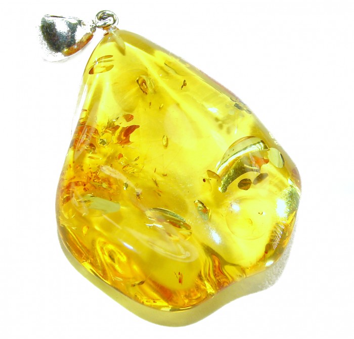 Sea Treasure Prehistoric Authentic Baltic Amber .925 Sterling Silver beautifully handcrafted Pendant - Stone close-up of amber pendant with sterling silver detail