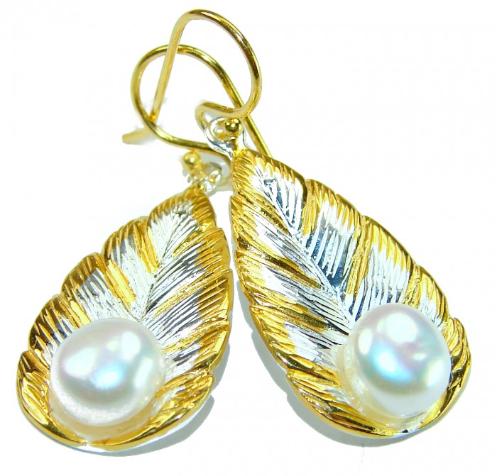 Classy Design - Genuine Pearl 14K Gold over .925 Sterling Silver handcrafted Statement Earrings - Close-up of leaf-shaped earrings with pearls and gold detailing.