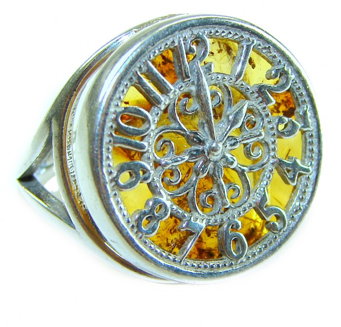 The Light Watchmaker Authentic Baltic Amber .925 Sterling Silver handcrafted ring; s. 6 adjustable - Close-up of The Light Watchmaker ring with amber and sterling silver.