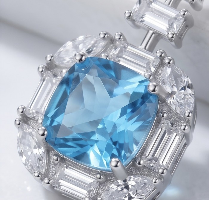 Atlantica 14.7 carat princess cut Swiss Blue Topaz rhodium over .925 Sterling Silver Handcrafted Statement earrings - Close-up of blue topaz stone with surrounding diamonds in rhodium setting