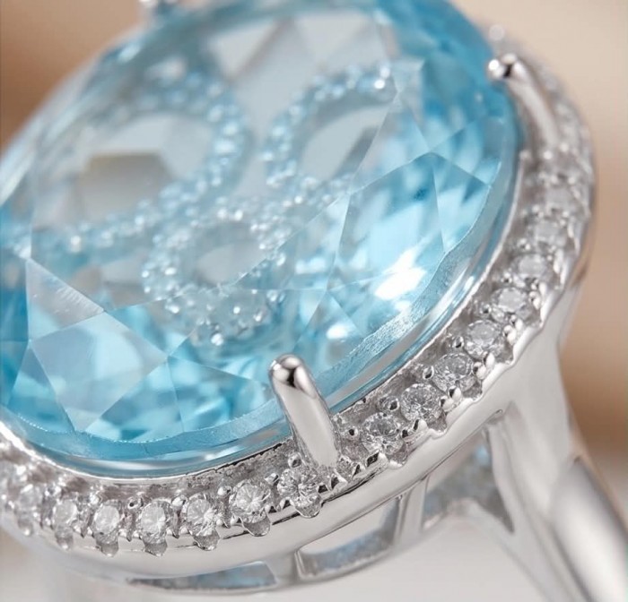Angelina 14.9 carat authentic Aquamarine .925 Sterling Silver Handcrafted Ring size 6 1/4 - Close-up of aquamarine ring with diamond accents in sterling silver.