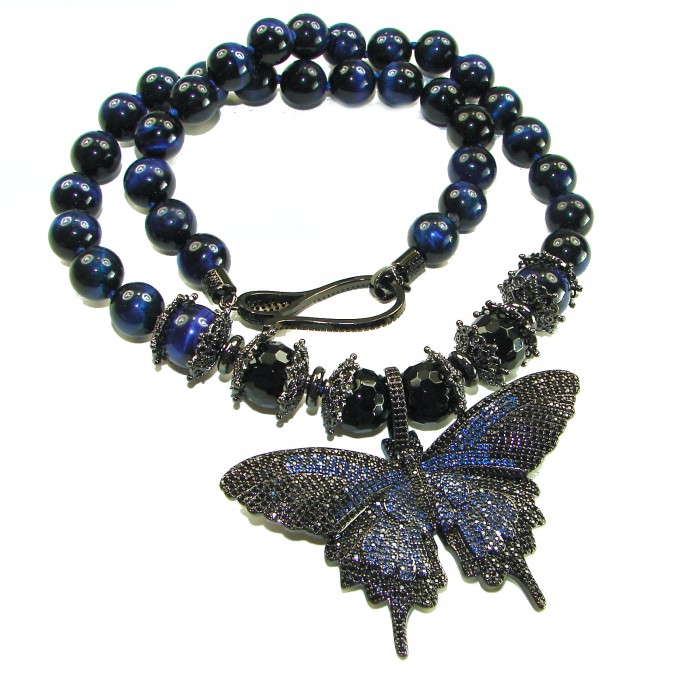 101.8 grams Blue Butterfly Rare Unusual Deep Blue Cats Eys Beads black rhodium over .925 Sterling Silver NECKLACE - Blue butterfly necklace with deep blue cat's eye beads, overhead view.