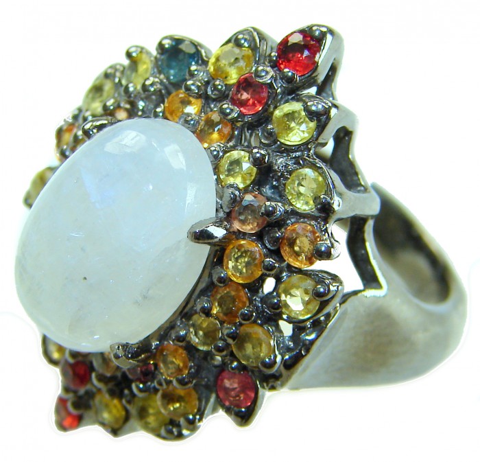 Best quality Genuine Fire Moonstone Sapphire black rhodium over .925 Sterling Silver handcrafted ring size 8 1/4 - Close-up of moonstone ring with colorful sapphires and black rhodium.