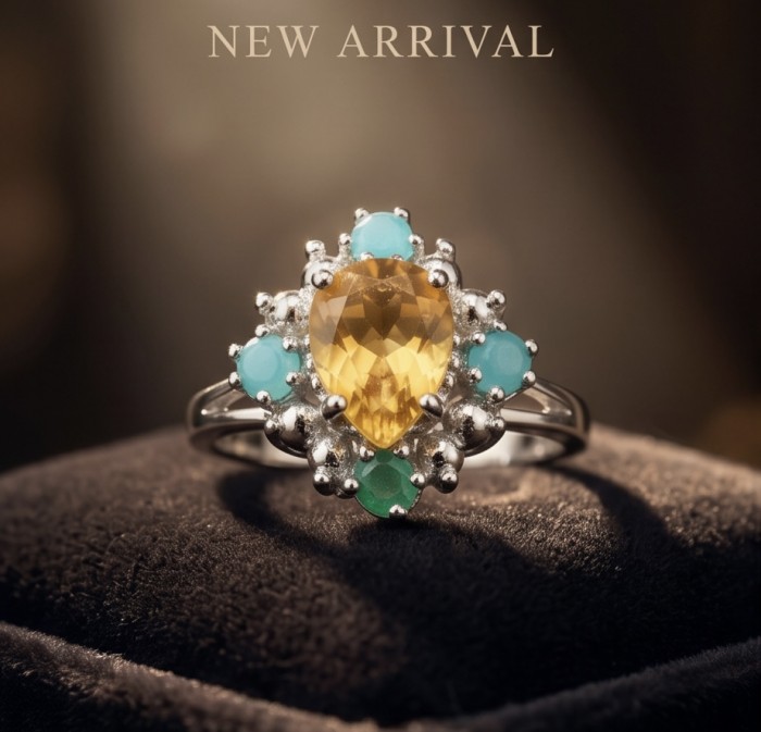 4.2 carat Brazilian Citrine Emerald rhodium over .925 Sterling Silver handcrafted ring; s. 6 - Close-up of Brazilian Citrine Emerald ring on display with "New Arrival" text