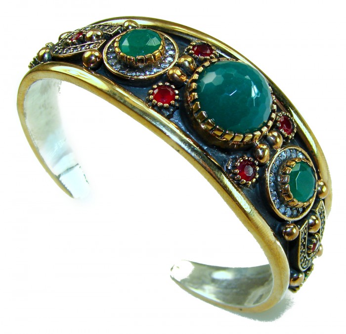 Victorian Style 22.5 carat Emerald Ruby & White Topaz .925 Sterling Silver Bracelet / Cuff - Side view of Victorian-style emerald, ruby, and topaz bracelet.