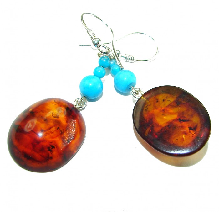 Baltic Polish Amber Turquoise .925 Sterling Silver Earrings - Baltic amber and turquoise sterling silver earrings, angled view.