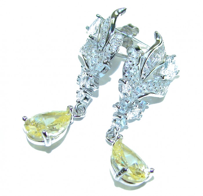 Luxurious 4.9 CARAT authentic yellow Sapphire .925 Sterling Silver handmade Earrings - Close-up of luxurious yellow sapphire sterling silver earrings.