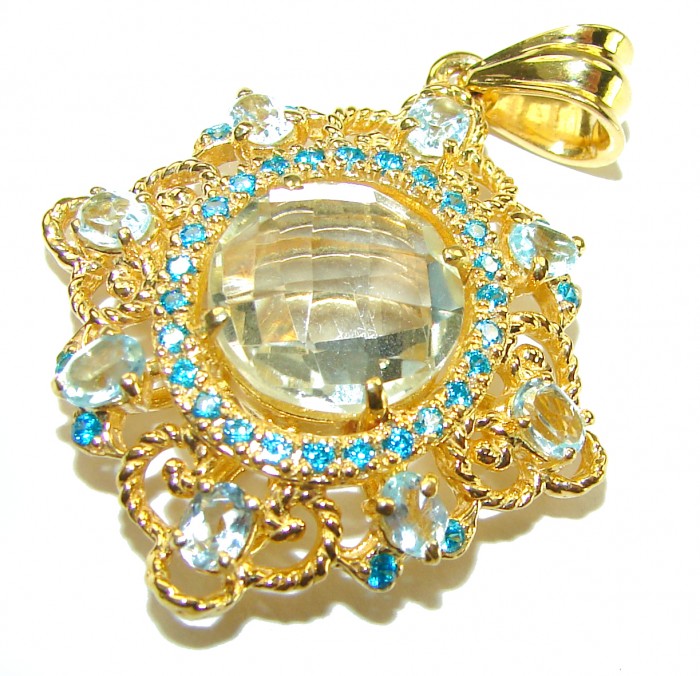 Celtic Spirit authentic fancy cut 14.5 carat White Topaz 18K Gold over .925 Sterling Silver handcrafted Statement Pendant - Close-up of White Topaz pendant with blue accents, ornate gold setting