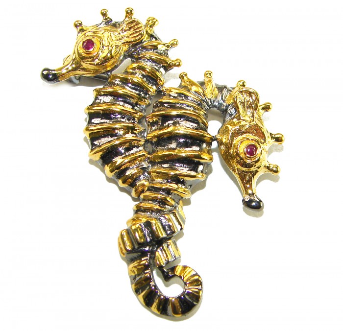 Two Seahorses Excellent 0.5 carat Ruby 14K Gold over .925 Sterling Silver handcrafted Pendant Brooch - Two seahorses brooch with ruby eyes in gold, front view.