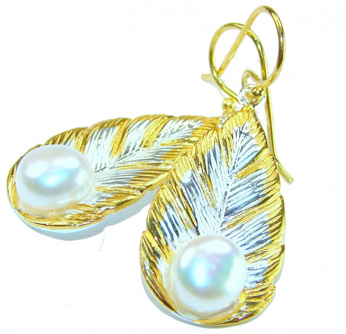 Classy Design - Genuine Pearl 14K Gold over .925 Sterling Silver handcrafted Statement Earrings - Close-up of gold and silver leaf earrings with pearls