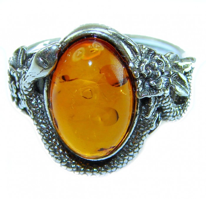 Snake Authentic Baltic Amber .925 Sterling Silver handcrafted ring; s. 5 1/4 - Close-up of snake-designed Baltic amber and sterling silver ring.