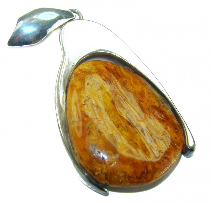 Sea Treasure Prehistoric Authentic Butterscotch Baltic Amber .925 Sterling Silver beautifully handcrafted Pendant - Close-up of Sea Treasure Butterscotch Baltic Amber pendant.