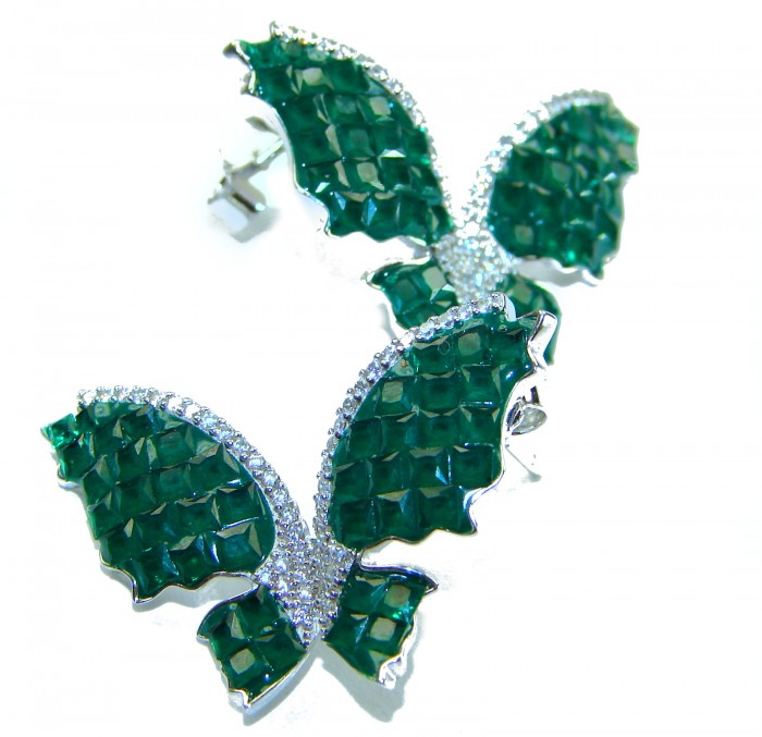 Incredible green Butterflies genuine 10.5 CARAT Emerald .925 Sterling Silver handcrafted Earrings - Close-up of silver and emerald butterfly earrings with intricate detail.